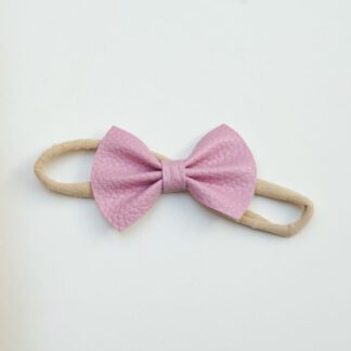 Handgemaakte roze haarband voor baby's