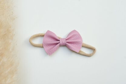 Handgemaakte roze haarband voor baby's